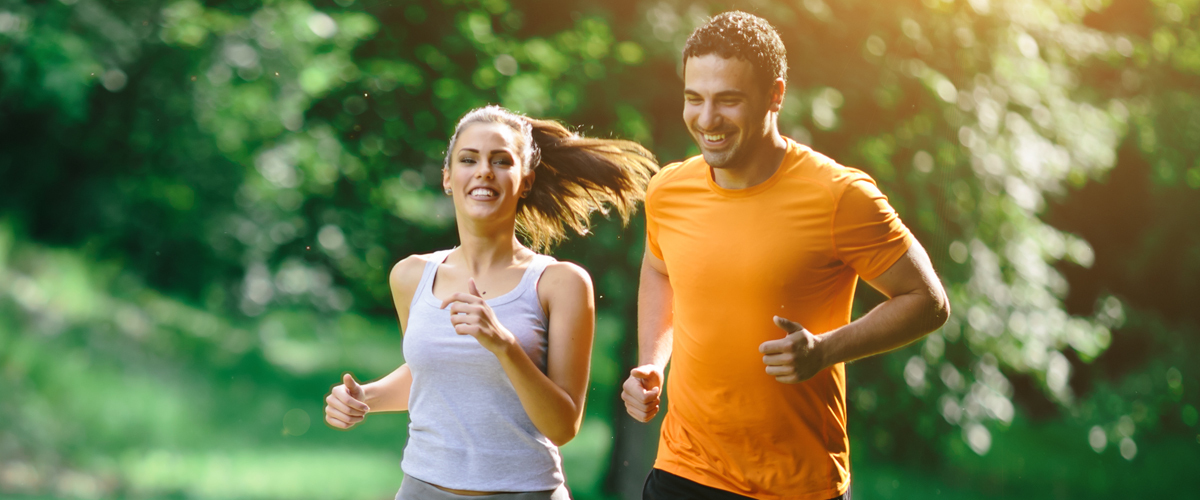 Couple jogging in park